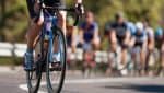 group of cyclists riding