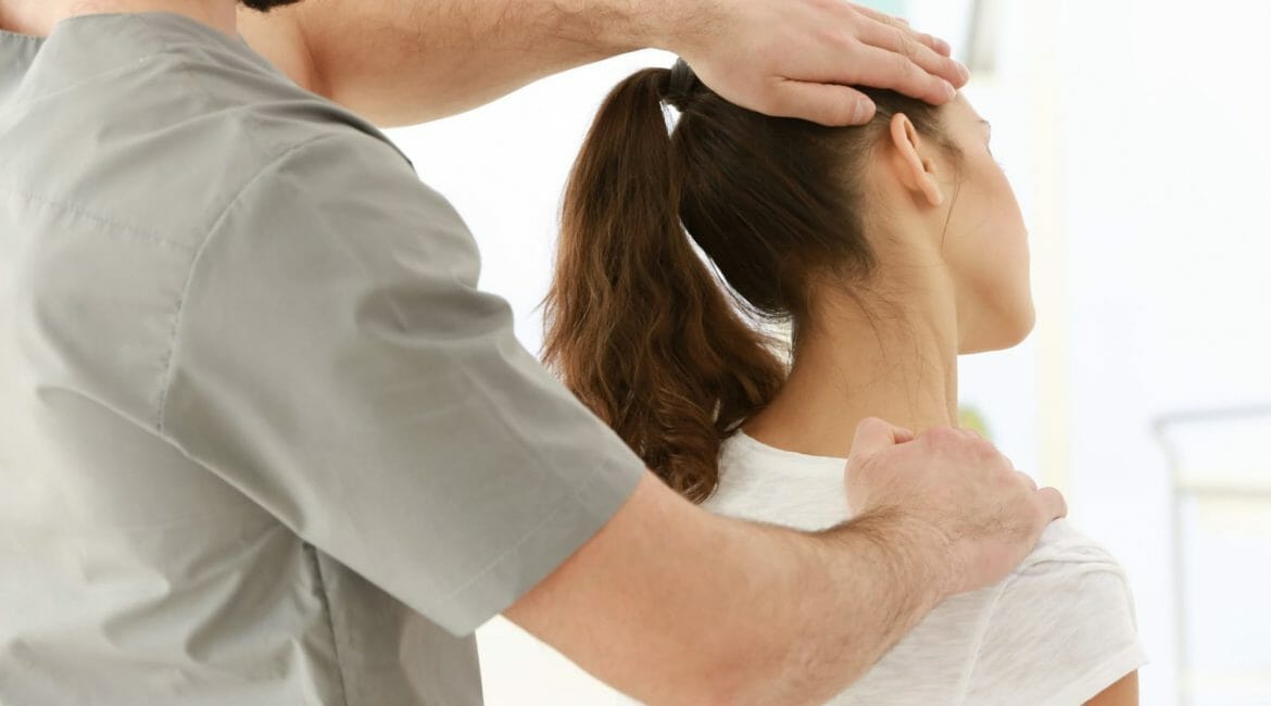 Chiropractor giving adjustment