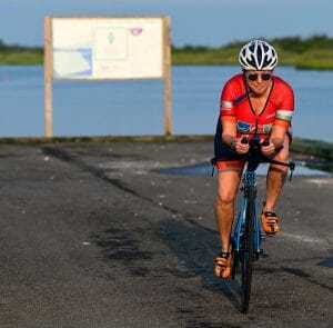 Hilary biking on her TT bike