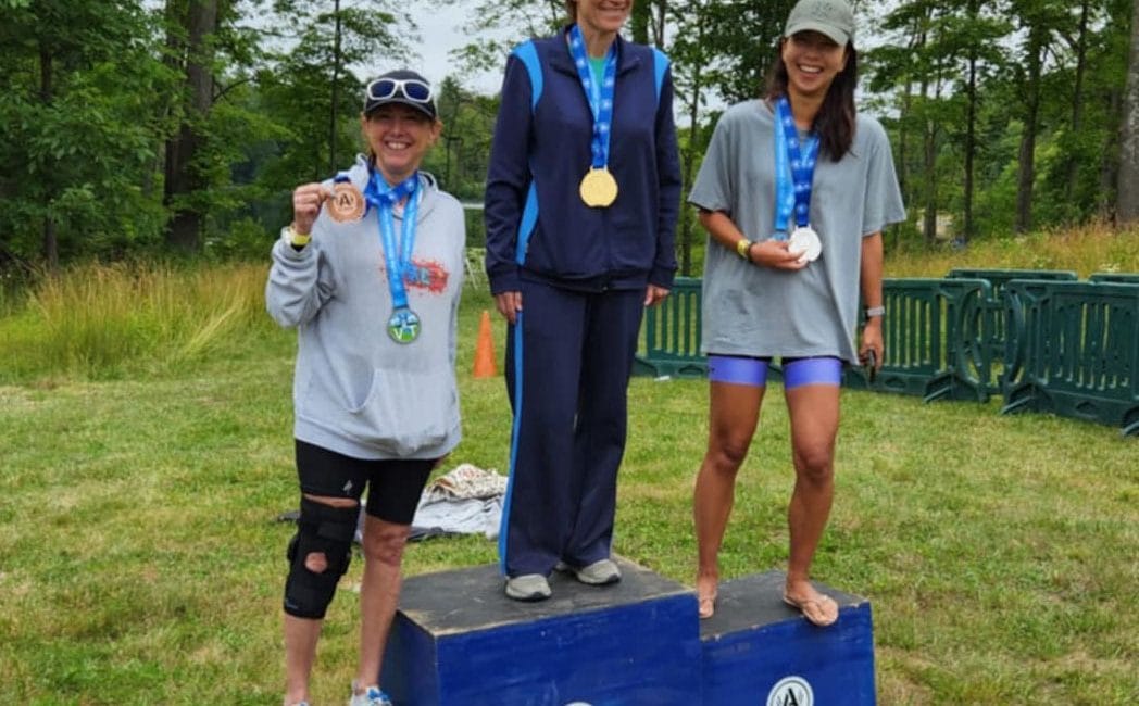 on the podium at the Hudson Valley Triathlon