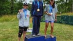 on the podium at the Hudson Valley Triathlon