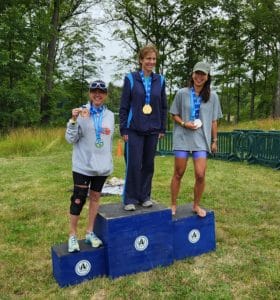 on the podium at the Hudson Valley Triathlon