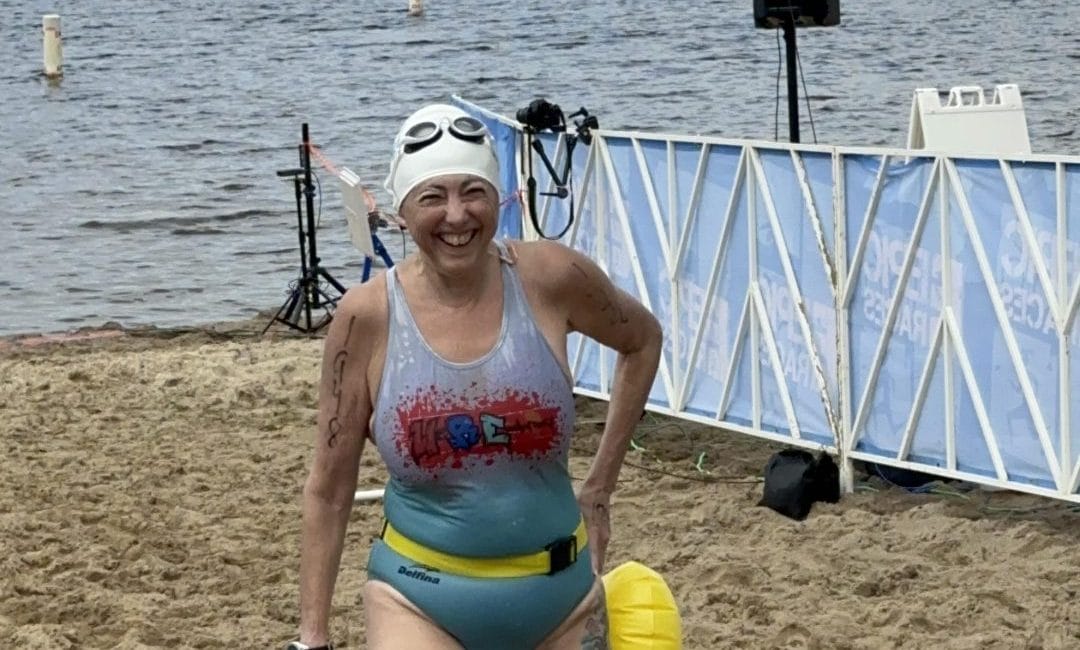 Hilary at the finish line at Swim to the Moon